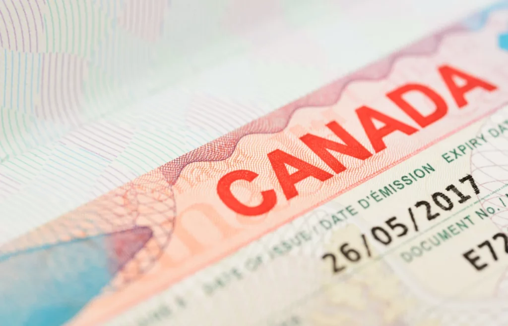 Foto da comprovação de um visto canadense feito com sucesso.